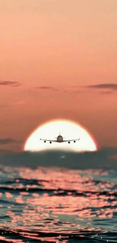 Airplane flying over a serene ocean at sunset.