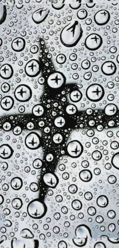 Airplane silhouette with water droplets creating an artistic effect.