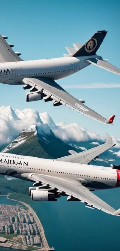 Two airplanes flying over mountains and ocean coastline.