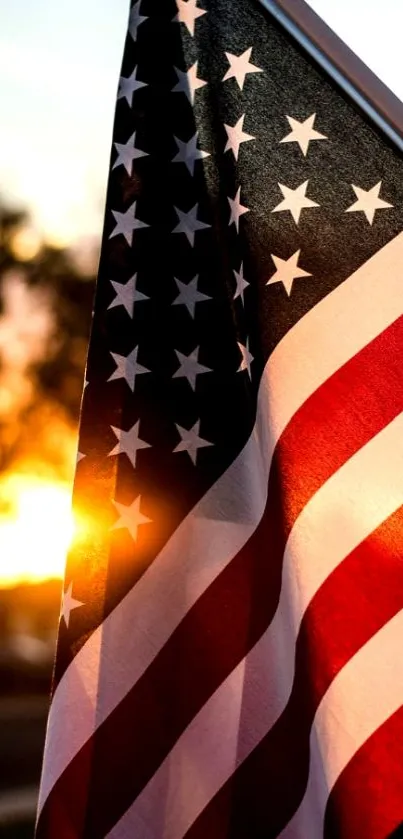 American flag lit by the sunset, capturing patriotism and freedom.