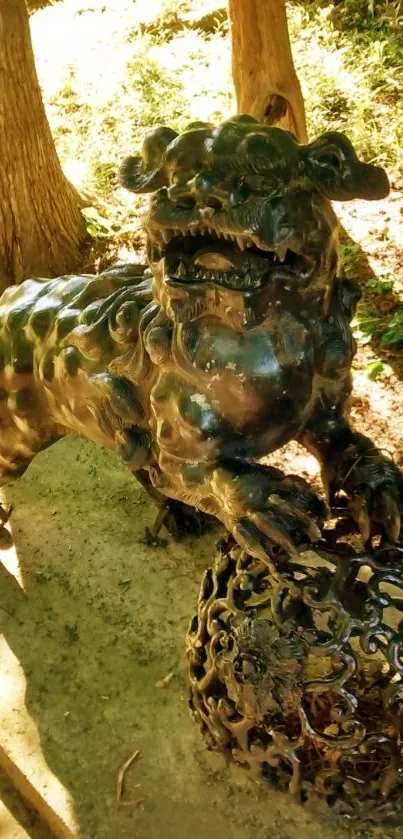 Bronze lion sculpture in a natural setting.