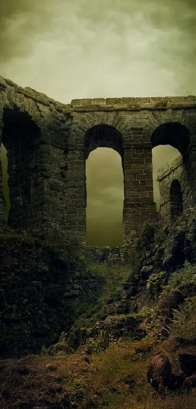 Ancient stone castle ruins under a cloudy sky.