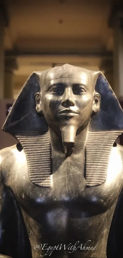 Majestic ancient Egyptian pharaoh statue in bronze on display.