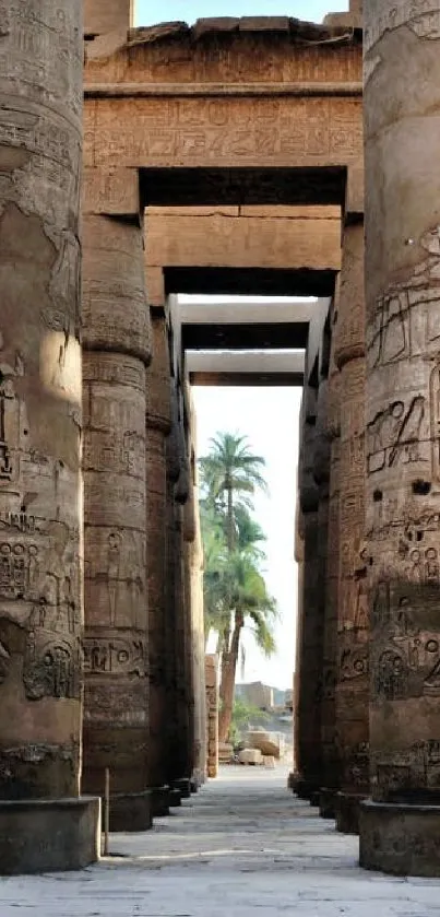 Ancient Egyptian temple corridor with intricate stone carvings.