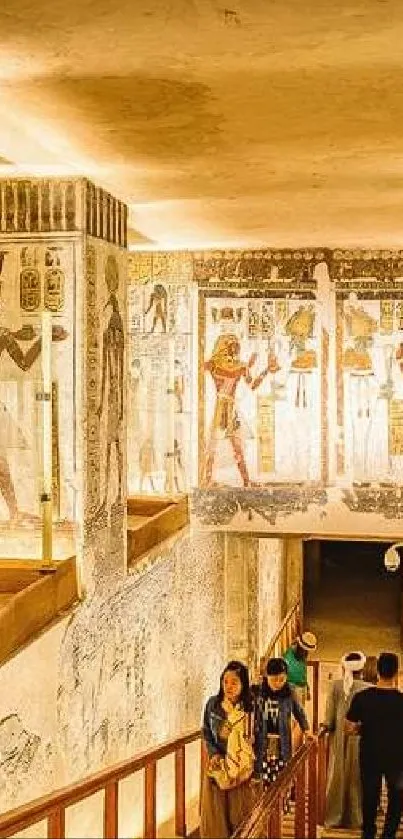 Illuminated Egyptian tomb passage with hieroglyphs and ancient art.