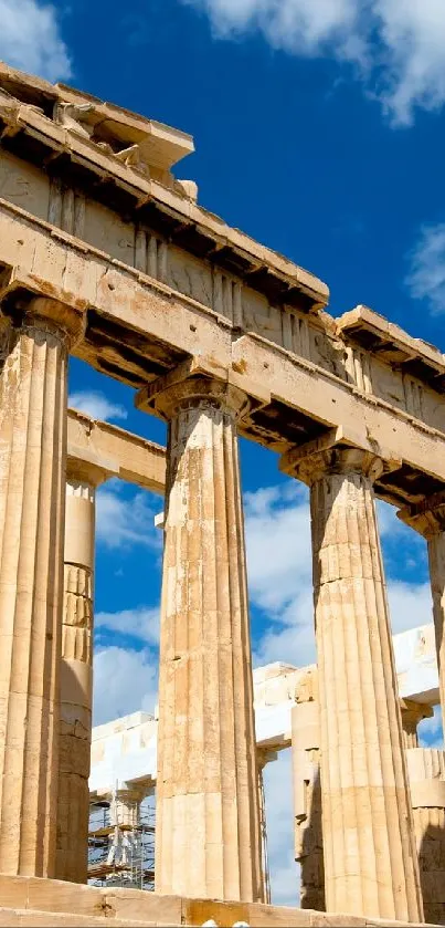 Ancient Parthenon against a bright blue sky.