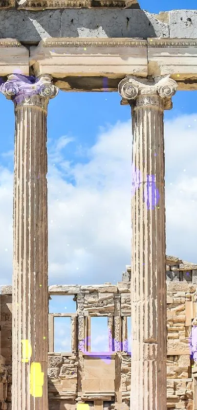 Ancient Greek columns under a blue sky.