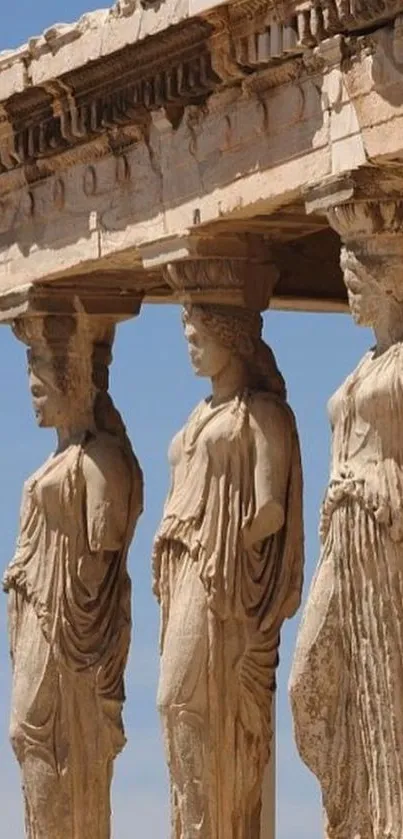 Ancient Caryatids of Erechtheion with a clear blue sky backdrop.