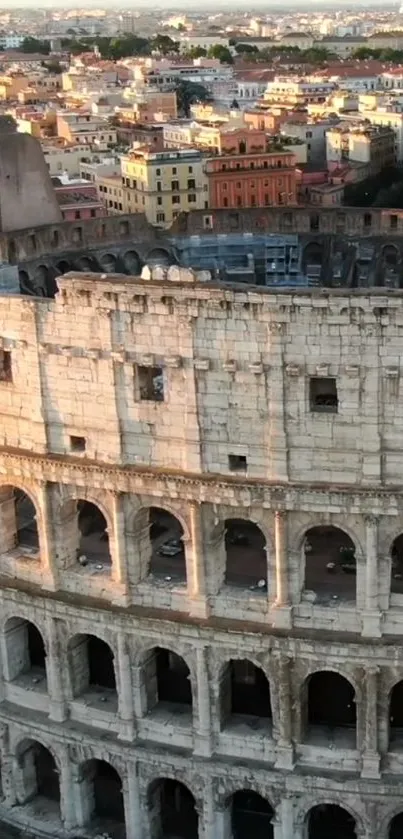 Aerial view of the ancient Roman Colosseum in Rome, Italy during sunset.