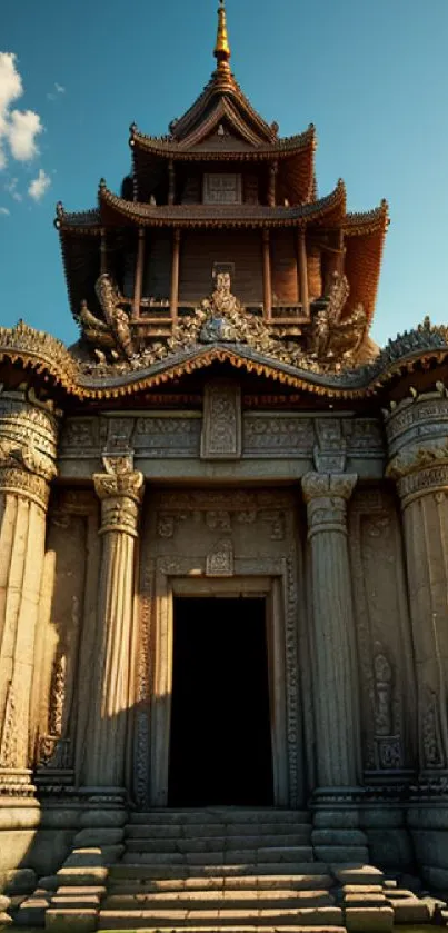 Ancient temple with intricate design and a clear blue sky background.