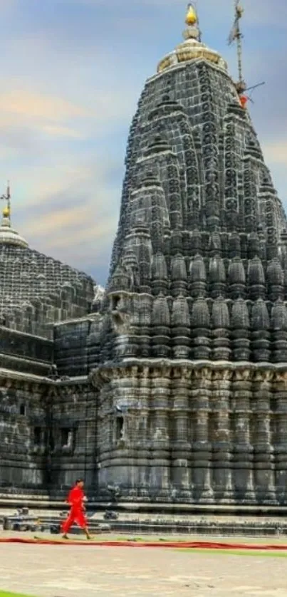 Ancient stone temple under a vivid blue sky.