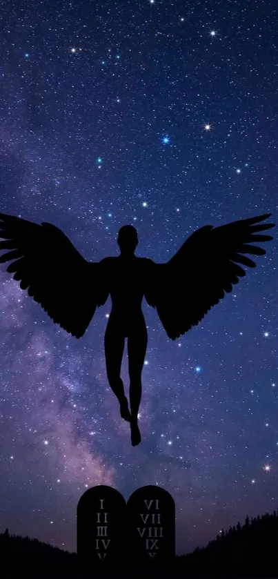 Silhouette of angel with wings against a starry galaxy night sky.