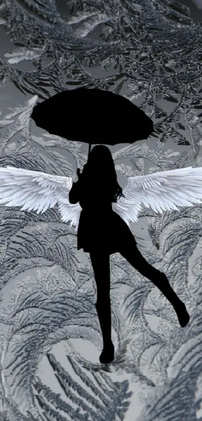 Silhouette with wings on a textured gray background.