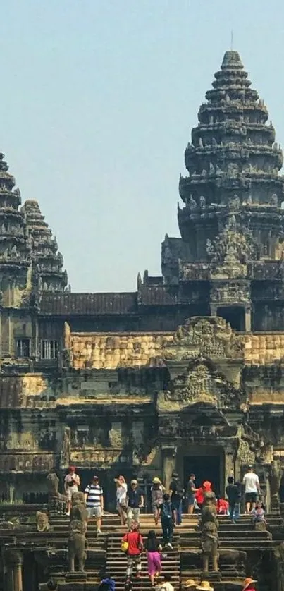 Angkor Wat temple with tourists in front.