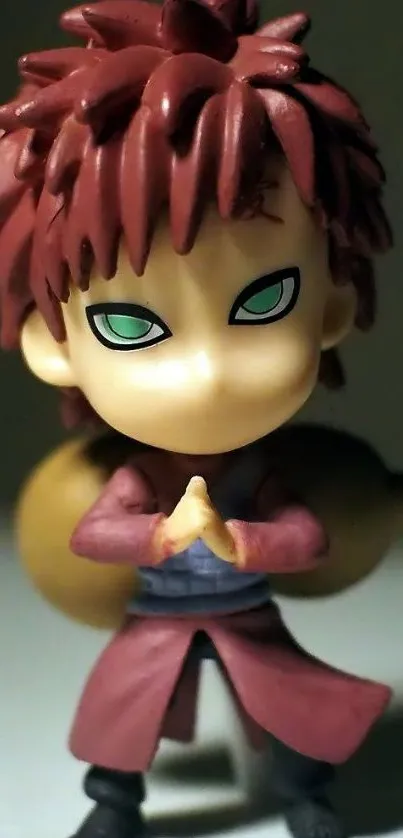 Anime figurine with brown hair and vibrant colors, hands clasped.