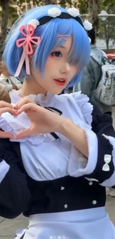 Anime cosplay with heart hand pose and blue hair.