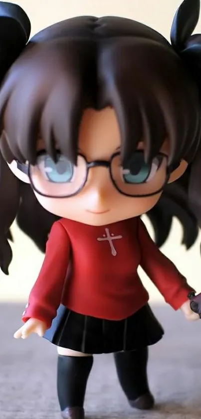 Cute anime figure with glasses in red outfit on mobile wallpaper.