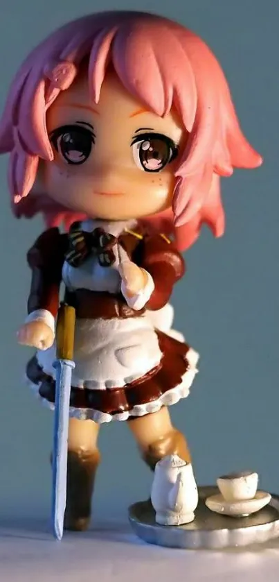 Charming pink-haired chibi anime figure in a maid outfit mobile wallpaper.