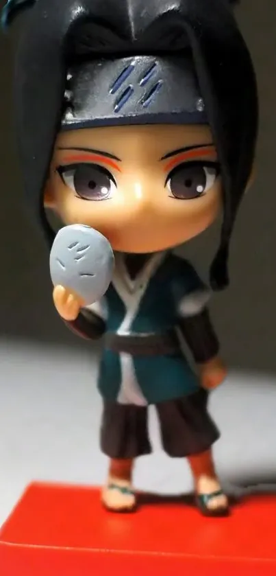 Anime figure holding a small stone, vibrant and colorful.