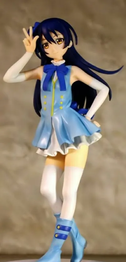 Anime figure in blue outfit against a neutral background.