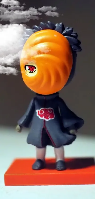 Anime figurine with orange mask on a minimalist background.