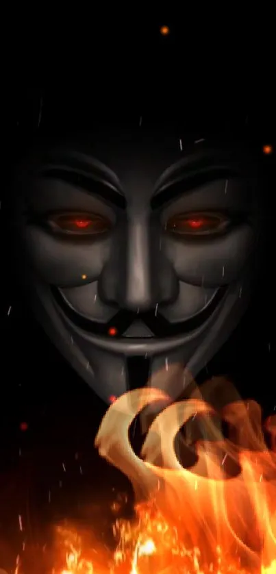 Anonymous mask with fiery flames on dark background.