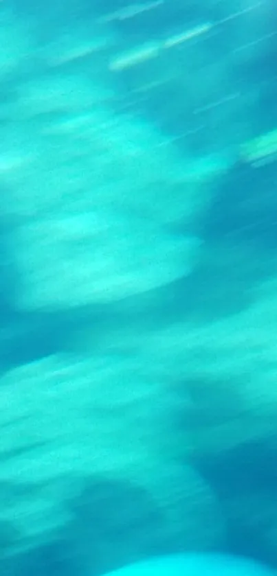 Teal and aqua blurred mobile wallpaper with oceanic tones.