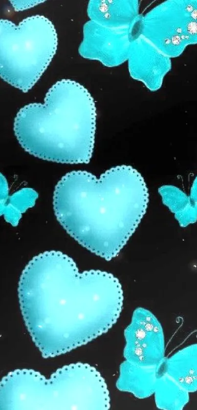 Aqua hearts and butterflies on black background wallpaper.