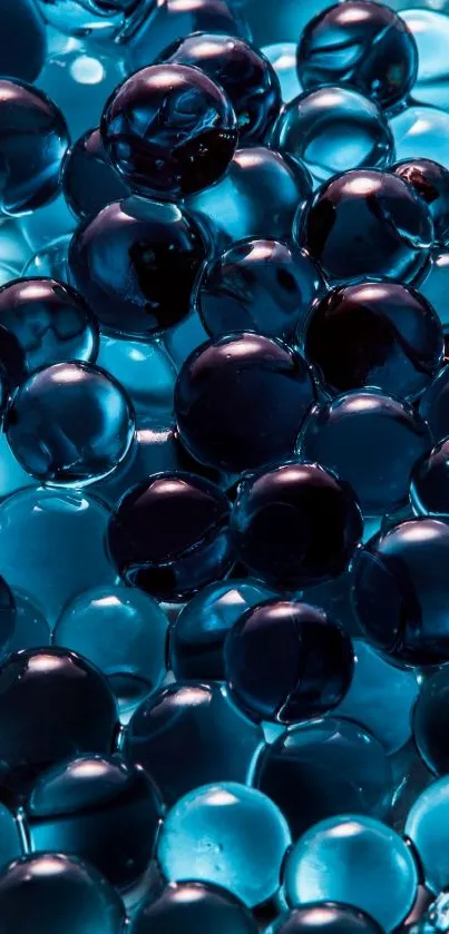 Mobile wallpaper featuring glossy aqua spheres with vibrant blue tones.