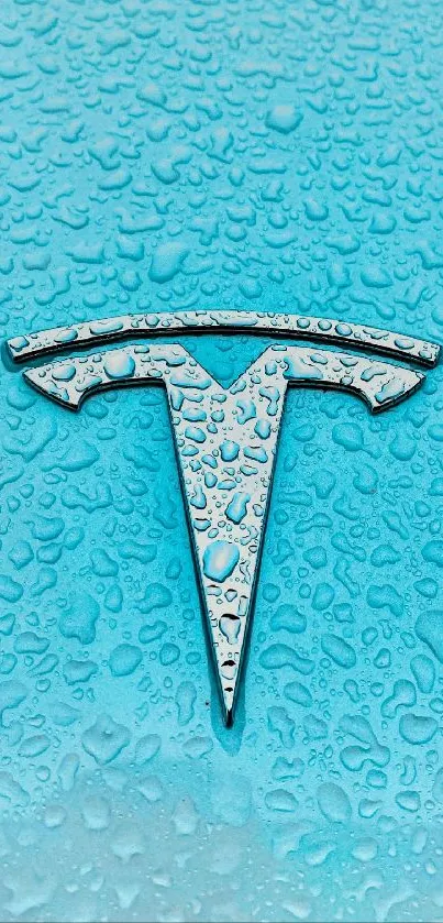 Tesla logo on an aqua background with water droplets.