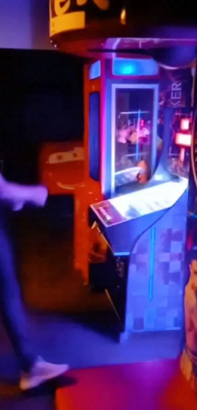 Man facing arcade punching bag under blue neon lights.