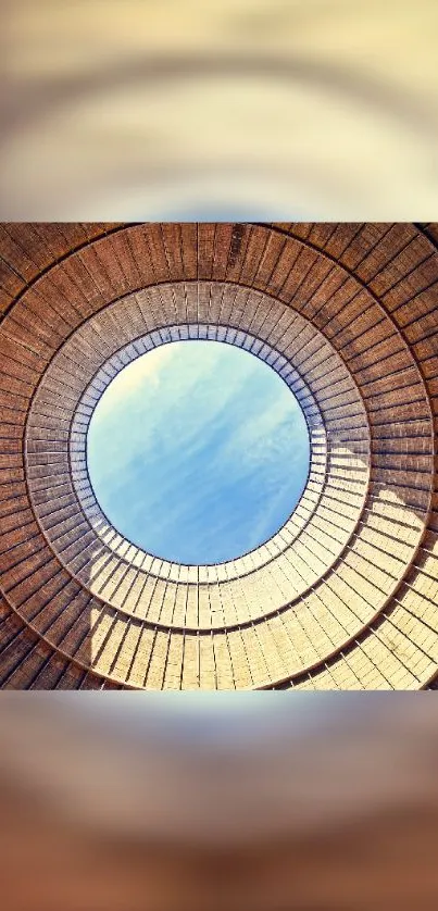 Modern spiral staircase leading to blue sky.