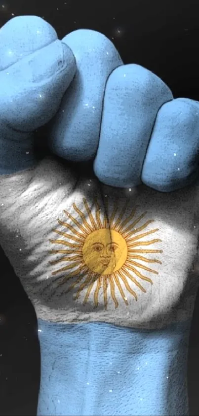 Argentinian flag painted on a clenched fist on a black background.