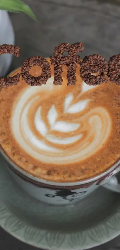 A cup of coffee with artistic latte art on a saucer.