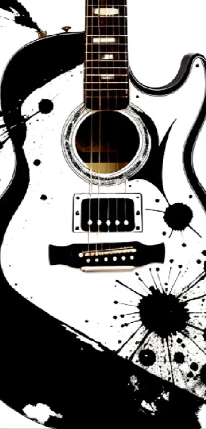 Black and white artistic guitar with paint splatters.