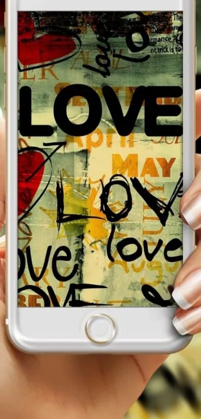 Artistic love-themed graffiti on mobile wallpaper.