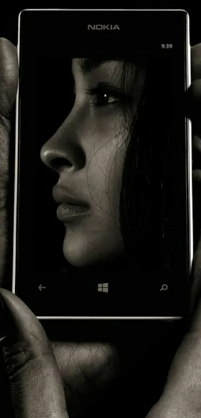 Artistic monochrome mobile wallpaper with a face reflection.