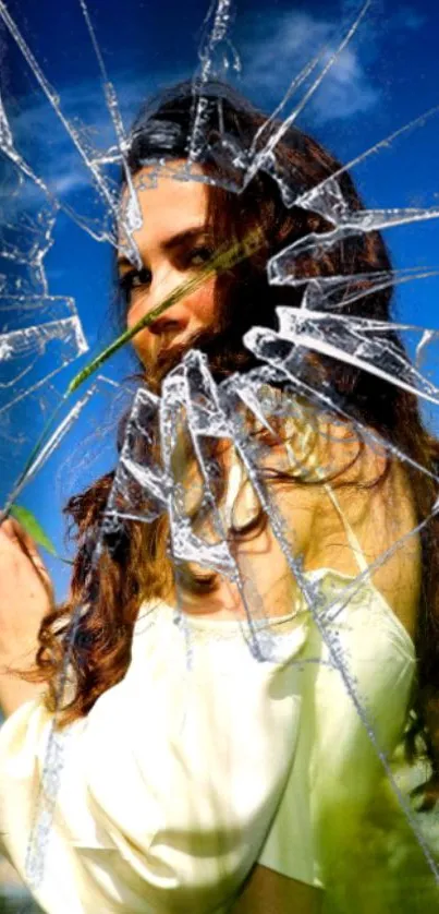 Shattered glass artistic wallpaper with a vivid sky and portrait effect.