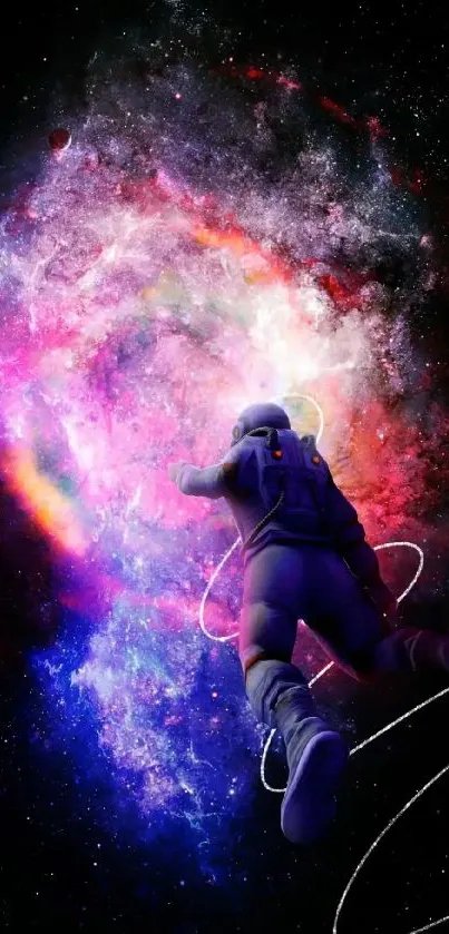 Astronaut floating through a colorful, vivid nebula in space wallpaper.