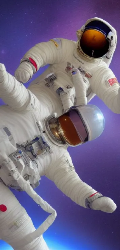 Two astronauts floating in space with a starry purple background.