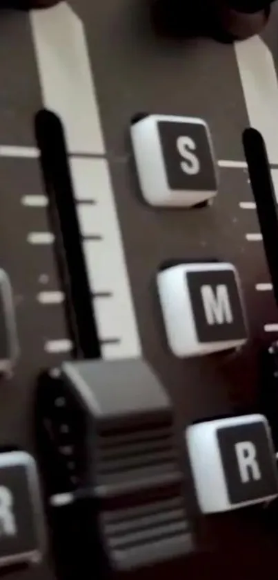 Close-up of an audio mixer's controls and buttons in high resolution.