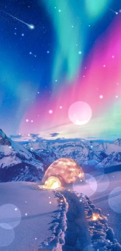 Igloo under vibrant Northern Lights in snowy mountains.