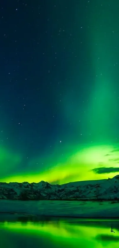 Aurora Borealis illuminates night sky over mountains.