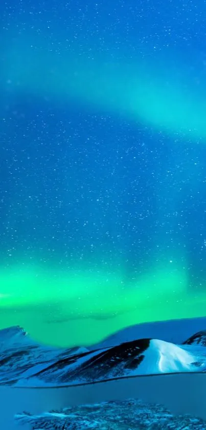 Vibrant aurora over snowy mountains with starry night sky.