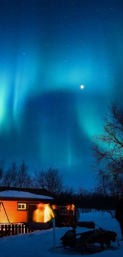 Aurora borealis lights up a snowy night with a cozy cabin in view.