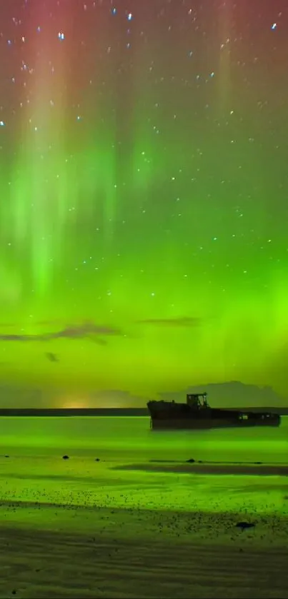 Vibrant green aurora borealis over a tranquil night landscape.