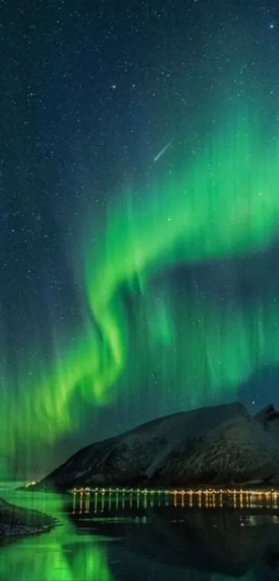 Beautiful Aurora Borealis over a mountain landscape at night.