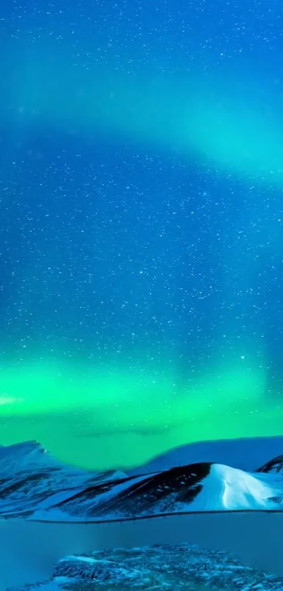 Aurora Borealis over snowy mountains at night with vivid teal and blue colors.
