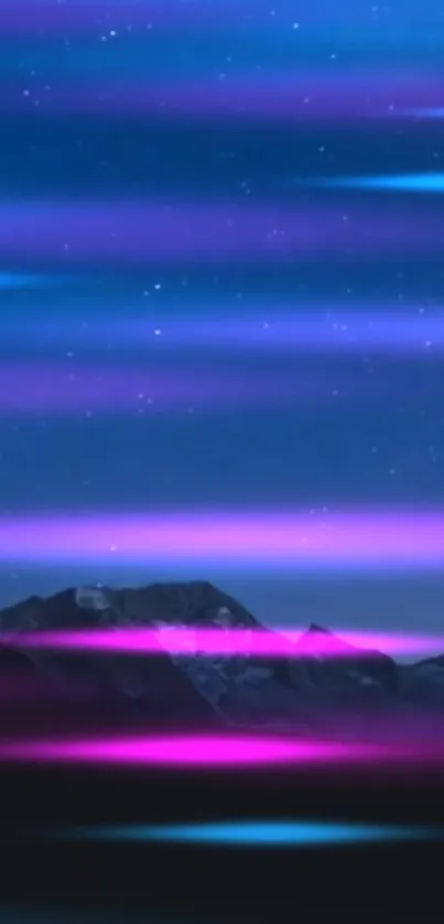 Purple and blue aurora over a starry mountain sky.