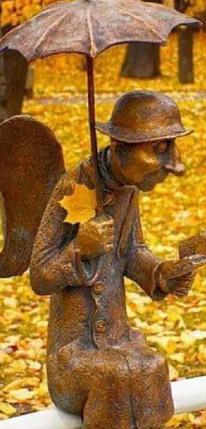 Statue of an angel with an umbrella surrounded by autumn leaves.